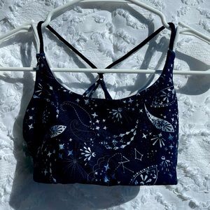 black patterned Ivivva sports bra
